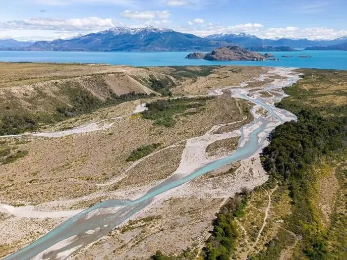 Framed Print : Aerial View of a creek flowing to the beautiful Lago General Carrera in southern Chile - Traveling the Carretera Framed Print : Aerial View of a creek flowing to the beautiful Lago General Carrera in southern Chile - Traveling the Carretera