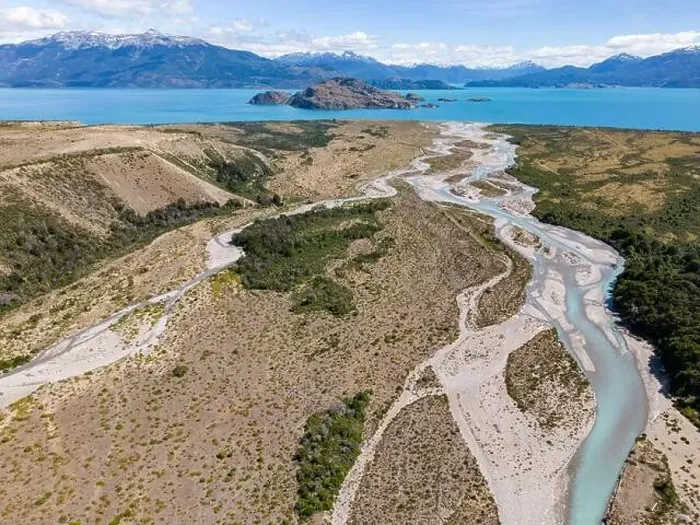 Framed Print : Aerial View of a creek flowing to the beautiful Lago General Carrera in southern Chile - Traveling the Carretera Framed Print : Aerial View of a creek flowing to the beautiful Lago General Carrera in southern Chile - Traveling the Carretera