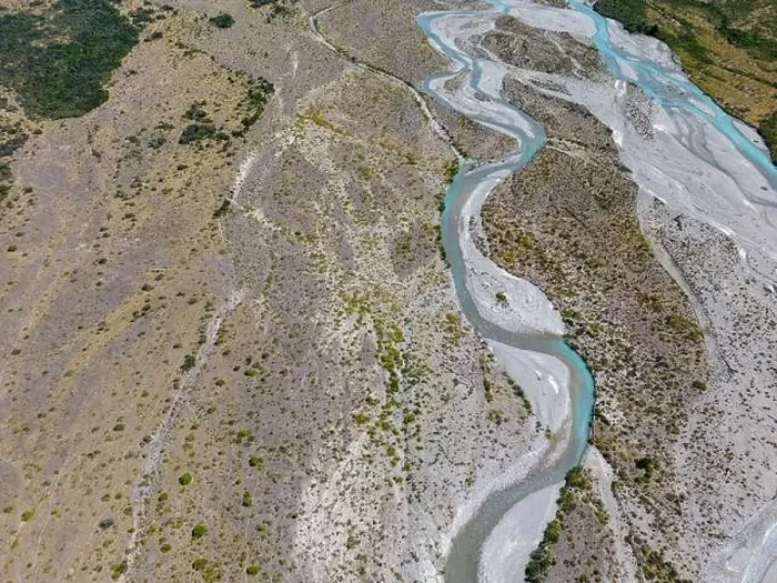 Framed Print : Aerial View of a creek flowing to the beautiful Lago General Carrera in southern Chile - Traveling the Carretera
