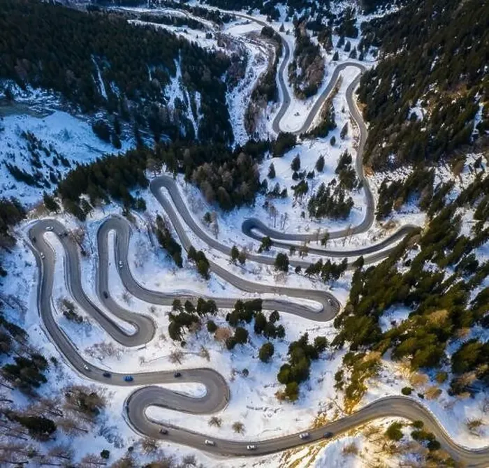 Framed Print : Aerial view of curves of Maloja Pass road, Bregaglia Valley, canton of Graubünden, Engadine, Switzerland Framed Print : Aerial view of curves of Maloja Pass road, Bregaglia Valley, canton of Graubünden, Engadine, Switzerland