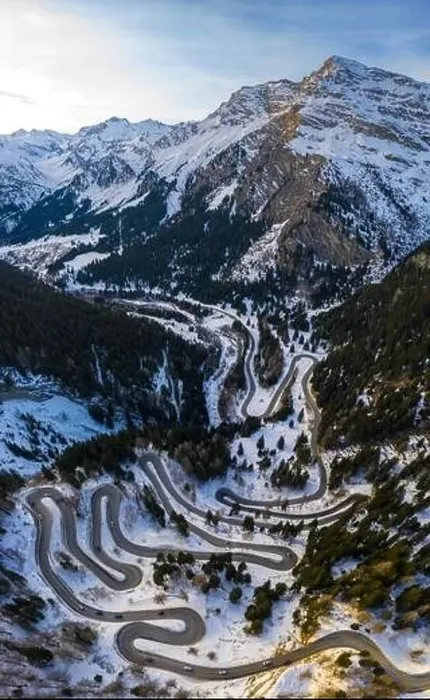 Framed Print : Aerial view of curves of Maloja Pass road, Bregaglia Valley, canton of Graubünden, Engadine, Switzerland Framed Print : Aerial view of curves of Maloja Pass road, Bregaglia Valley, canton of Graubünden, Engadine, Switzerland