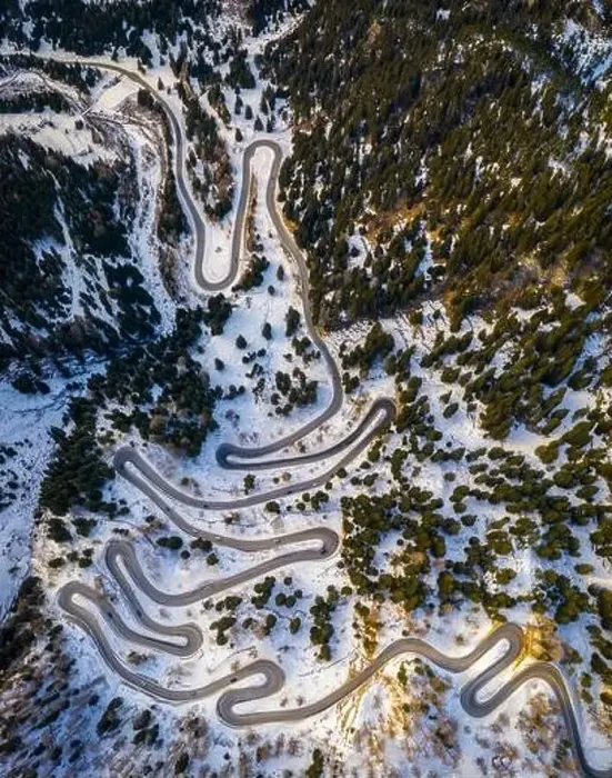 Framed Print : Aerial view of curves of Maloja Pass road, Bregaglia Valley, canton of Graubünden, Engadine, Switzerland Framed Print : Aerial view of curves of Maloja Pass road, Bregaglia Valley, canton of Graubünden, Engadine, Switzerland