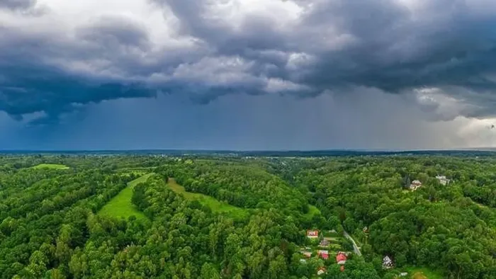 Framed Print : Aerial view of dark cloudy sky over forest minute before rain Framed Print : Aerial view of dark cloudy sky over forest minute before rain