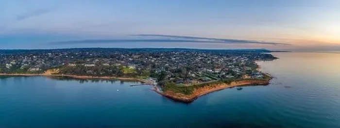 Framed Print : Aerial view of Daveys Bay Yacht Club and scenic coastline at sunset in Melbourne, Australia Framed Print : Aerial view of Daveys Bay Yacht Club and scenic coastline at sunset in Melbourne, Australia