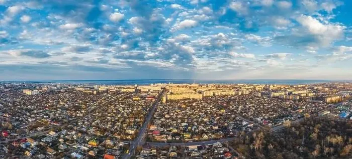 Framed Print : Aerial view from drone. Aerial view amazing sunset over of the suburbs with the city, far villages and fields Framed Print : Aerial view from drone. Aerial view amazing sunset over of the suburbs with the city, far villages and fields