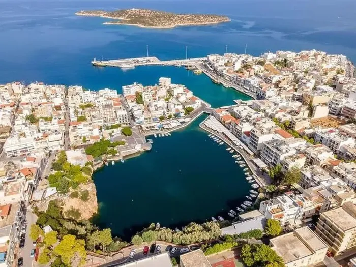 Framed Print : Aerial top view by drone of Agios Nikolaos city. Greece, Crete Framed Print : Aerial top view by drone of Agios Nikolaos city. Greece, Crete