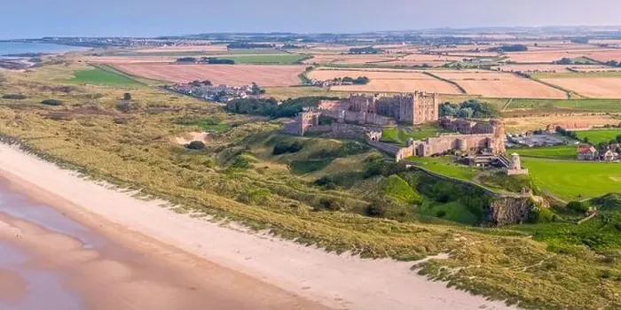 Framed Print : Aerial view by drone of Bamburgh Castle, Bamburgh, Northumberland, England, United Kingdom, Europe Framed Print : Aerial view by drone of Bamburgh Castle, Bamburgh, Northumberland, England, United Kingdom, Europe