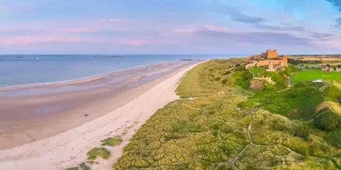 Framed Print : Aerial view by drone of Bamburgh Castle, Bamburgh, Northumberland, England, United Kingdom, Europe Framed Print : Aerial view by drone of Bamburgh Castle, Bamburgh, Northumberland, England, United Kingdom, Europe