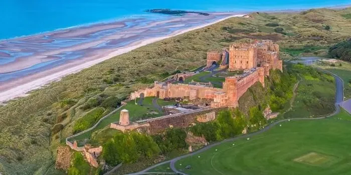 Framed Print : Aerial view by drone of Bamburgh Castle, Bamburgh, Northumberland, England, United Kingdom, Europe Framed Print : Aerial view by drone of Bamburgh Castle, Bamburgh, Northumberland, England, United Kingdom, Europe
