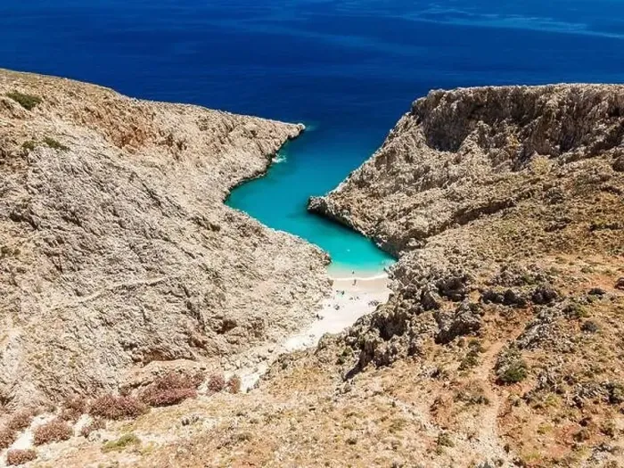Framed Print : Aerial top view by drone of beach of Seitan Limania in bay with turquoise water and an unusual shape in Akrotiri, Crete Framed Print : Aerial top view by drone of beach of Seitan Limania in bay with turquoise water and an unusual shape in Akrotiri, Crete