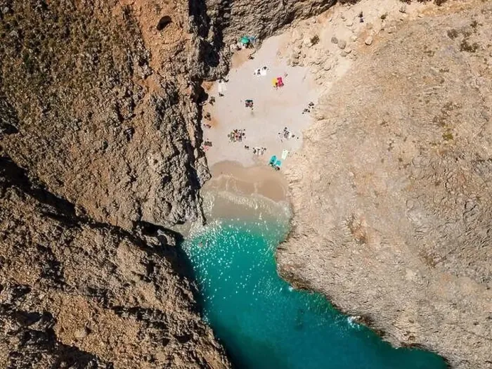 Framed Print : Aerial top view by drone of beach of Seitan Limania in bay with turquoise water and an unusual shape in Akrotiri, Crete Framed Print : Aerial top view by drone of beach of Seitan Limania in bay with turquoise water and an unusual shape in Akrotiri, Crete