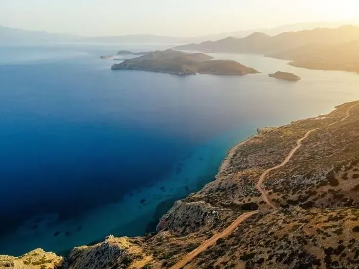 Framed Print : Aerial view by drone of idyllic seascape with mediterranean island Framed Print : Aerial view by drone of idyllic seascape with mediterranean island