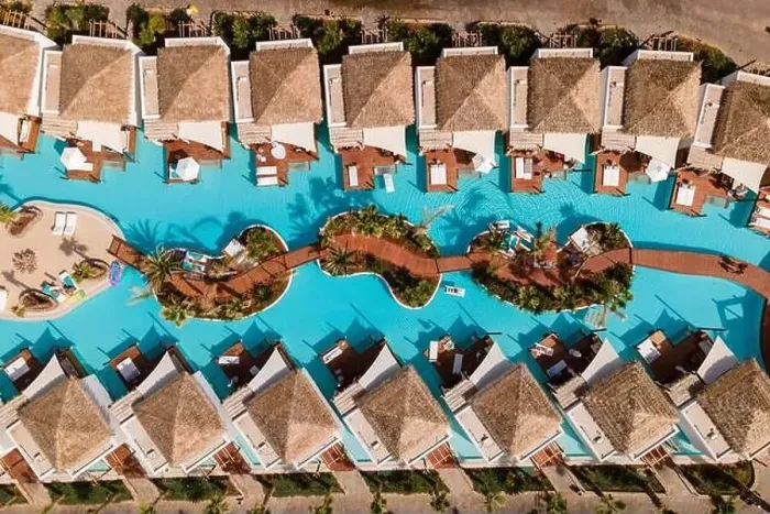 Framed Print : Aerial top view by drone of a tropical hotel with a pool Framed Print : Aerial top view by drone of a tropical hotel with a pool
