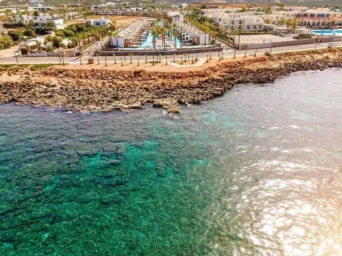 Framed Print : Aerial top view by drone of a tropical hotel with a pool Framed Print : Aerial top view by drone of a tropical hotel with a pool