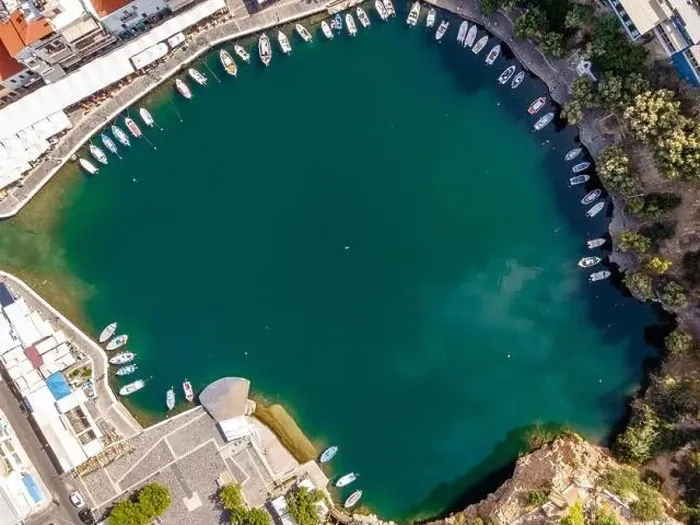 Framed Print : Aerial top view by drone of Voulismeni Lake in Agios Nikolaos city. Greece, Crete Framed Print : Aerial top view by drone of Voulismeni Lake in Agios Nikolaos city. Greece, Crete