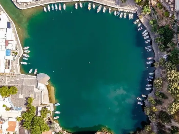 Framed Print : Aerial top view by drone of Voulismeni Lake in Agios Nikolaos city. Greece, Crete Framed Print : Aerial top view by drone of Voulismeni Lake in Agios Nikolaos city. Greece, Crete