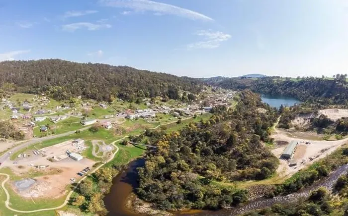 Framed Print : An aerial view from a drone on a warm spring day over Derby in Tasmania, Australia Framed Print : An aerial view from a drone on a warm spring day over Derby in Tasmania, Australia