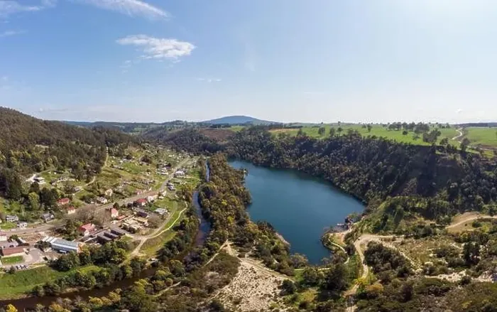 Framed Print : An aerial view from a drone on a warm spring day over Derby in Tasmania, Australia Framed Print : An aerial view from a drone on a warm spring day over Derby in Tasmania, Australia