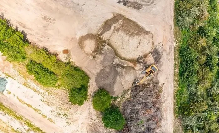 Framed Print : aerial view of an excavator in a landscape Framed Print : aerial view of an excavator in a landscape