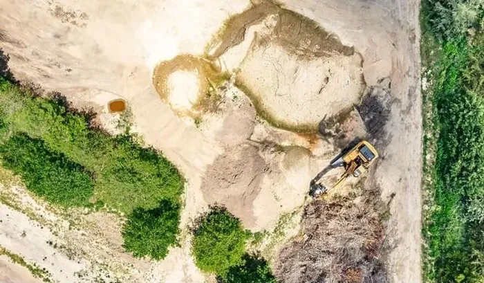 Framed Print : aerial view of an excavator in a landscape Framed Print : aerial view of an excavator in a landscape