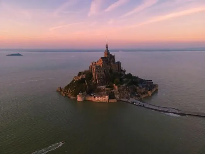 Framed Print : Aerial view of famous Le Mont-Saint-Michel at sunset in Normandie, France Framed Print : Aerial view of famous Le Mont-Saint-Michel at sunset in Normandie, France