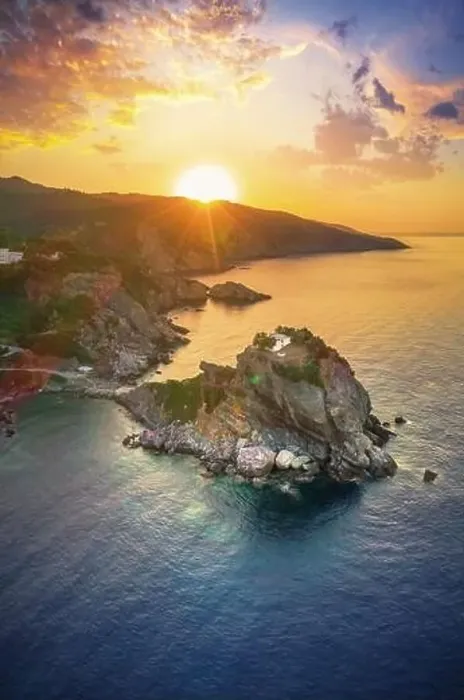 Framed Print : Aerial view of the famous small church Agios Ioannis in Skopelos island, Greece Framed Print : Aerial view of the famous small church Agios Ioannis in Skopelos island, Greece