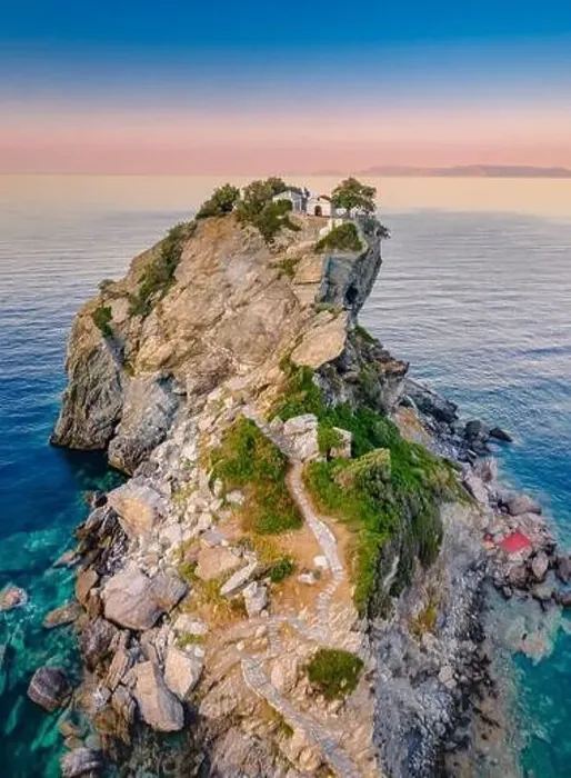 Framed Print : Aerial view of the famous small church Agios Ioannis in Skopelos island, Greece Framed Print : Aerial view of the famous small church Agios Ioannis in Skopelos island, Greece