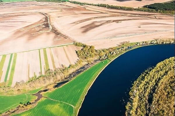 Aerial View Fields And River Landscape In Sunny Spring Summer Day. Top View Of Nature, Bird's Eye View. Trees Standing In Water During Spring Flood
