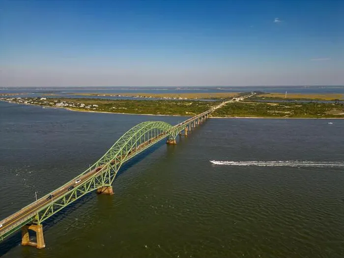 Framed Print : An aerial view of the Fire Island Inlet Bridge and the Robert Moses Causeway on a sunny day on Long Island, New York Framed Print : An aerial view of the Fire Island Inlet Bridge and the Robert Moses Causeway on a sunny day on Long Island, New York