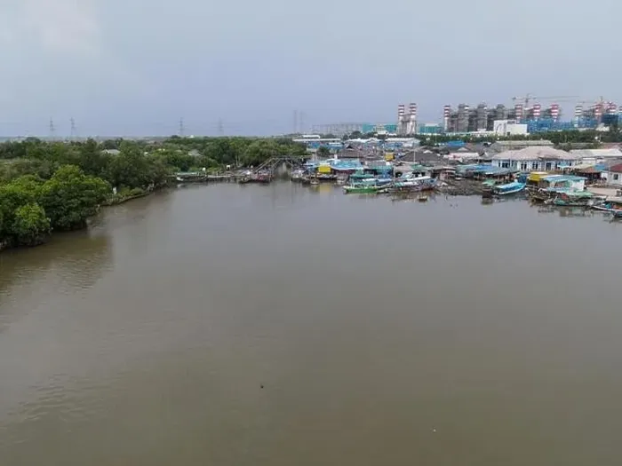 Framed Print : Aerial view of fisherman village and mangrove forest in rainy season. Bekasi, Indonesia, March 9, 2021 Framed Print : Aerial view of fisherman village and mangrove forest in rainy season. Bekasi, Indonesia, March 9, 2021