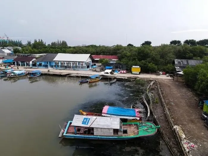 Framed Print : Aerial view of fisherman village and mangrove forest in rainy season. Bekasi, Indonesia, March 9, 2021 Framed Print : Aerial view of fisherman village and mangrove forest in rainy season. Bekasi, Indonesia, March 9, 2021