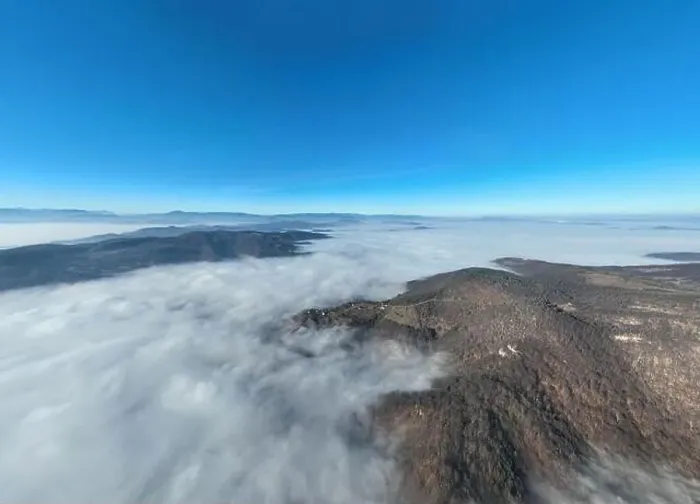 Framed Print : Aerial View. Flying over the high mountains in beautiful clouds Framed Print : Aerial View. Flying over the high mountains in beautiful clouds