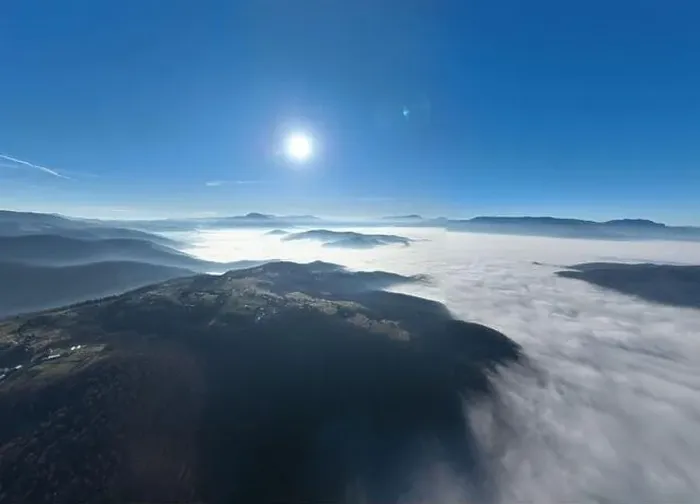 Framed Print : Aerial View. Flying over the high mountains in beautiful clouds Framed Print : Aerial View. Flying over the high mountains in beautiful clouds