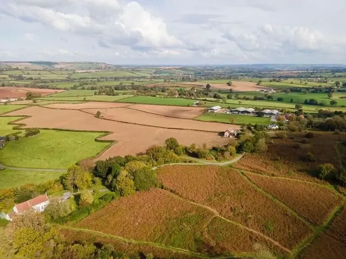 Framed Print : Aerial view following Knowle Hill through the surrounding farmland around the outskirts of Chew Magna village Framed Print : Aerial view following Knowle Hill through the surrounding farmland around the outskirts of Chew Magna village