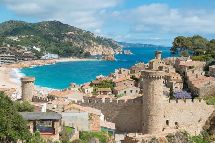 Framed Print : Aerial view of Fortress Vila Vella and Badia de Tossa bay at summer in Tossa de Mar on Costa Brava, Catalonia, Spain Framed Print : Aerial view of Fortress Vila Vella and Badia de Tossa bay at summer in Tossa de Mar on Costa Brava, Catalonia, Spain