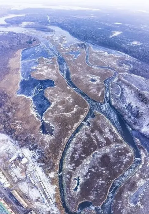Framed Print : Aerial view on a frozen river landscape. Winter nature from a drone from above Framed Print : Aerial view on a frozen river landscape. Winter nature from a drone from above
