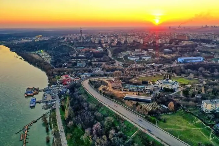 Framed Print : Aerial view of Galati City, Romania. Danube River near city with sunset warm light Framed Print : Aerial view of Galati City, Romania. Danube River near city with sunset warm light