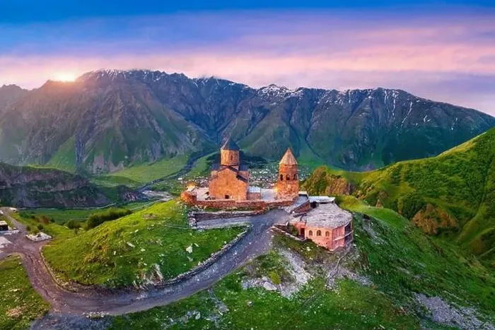 Framed Print : Aerial view of Gergeti trinity church at sunrise in Georgia Framed Print : Aerial view of Gergeti trinity church at sunrise in Georgia