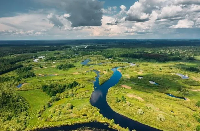Framed Print : Aerial View Of Green Forest, Meadow And River Landscape In Summer Day. Top View Of European Nature From High Attitude In Summer Day. Bird's Eye View Framed Print : Aerial View Of Green Forest, Meadow And River Landscape In Summer Day. Top View Of European Nature From High Attitude In Summer Day. Bird's Eye View