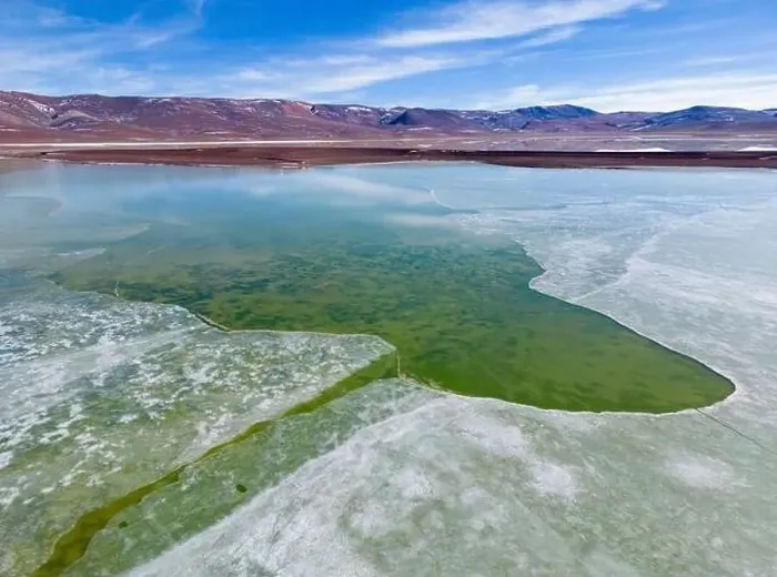 Framed Print : Aerial view of the green and partly frozen Laguna del Negro Francisco in the Atacama desert in Chile - Traveling