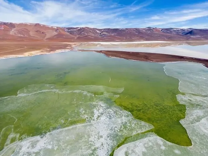 Framed Print : Aerial view of the green and partly frozen Laguna del Negro Francisco in the Atacama desert in Chile - Traveling