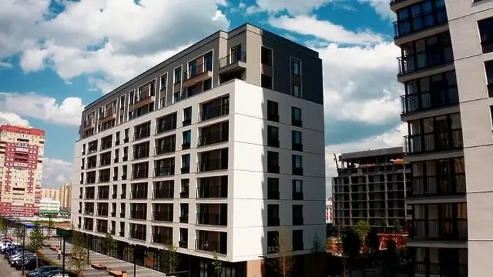Framed Print : Aerial view of a high residential building of a newly built city aeria. Stock footage. Concept of urbanization Framed Print : Aerial view of a high residential building of a newly built city aeria. Stock footage. Concept of urbanization