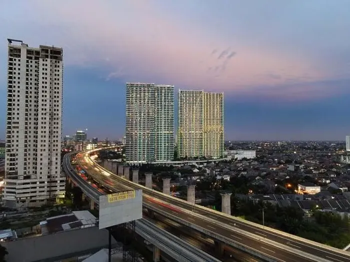 Framed Print : Aerial view of highway intersection and buildings in the city of Bekasi and noise cloud with Bekasi cityscape Framed Print : Aerial view of highway intersection and buildings in the city of Bekasi and noise cloud with Bekasi cityscape