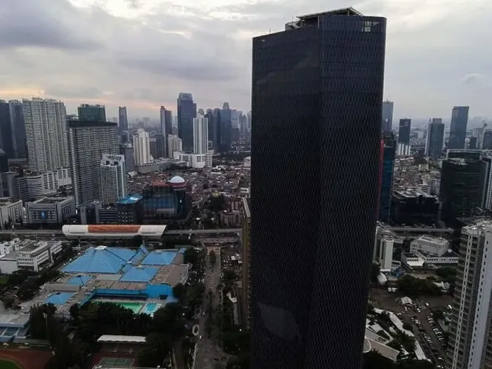 Framed Print : Aerial view of highway intersection and buildings in the city of Jakarta and noise cloud with Jakarta cityscape Framed Print : Aerial view of highway intersection and buildings in the city of Jakarta and noise cloud with Jakarta cityscape
