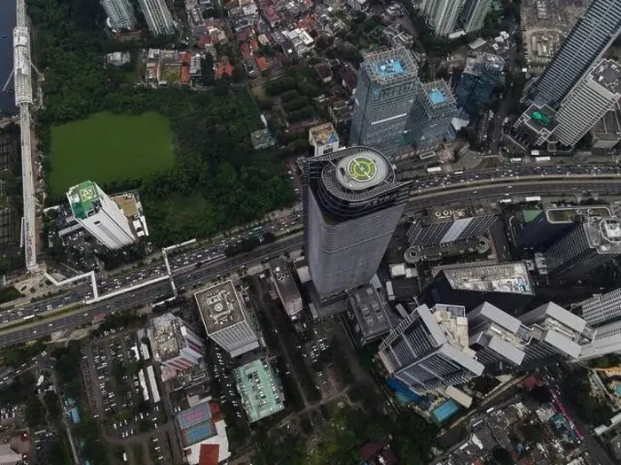 Framed Print : Aerial view of highway intersection and buildings in the city of Jakarta and noise cloud with Jakarta cityscape Framed Print : Aerial view of highway intersection and buildings in the city of Jakarta and noise cloud with Jakarta cityscape