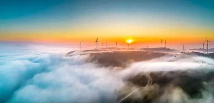 Framed Print : Aerial view top hill at dawn with fog covering small village in valley Framed Print : Aerial view top hill at dawn with fog covering small village in valley