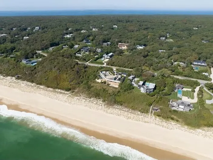 Framed Print : aerial view of homes along the coast
