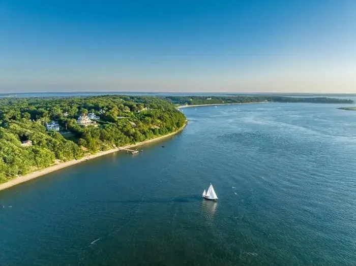 Framed Print : aerial view of homes on Shelter Heights water front homes and a sailboat Framed Print : aerial view of homes on Shelter Heights water front homes and a sailboat