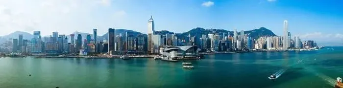 Framed Print : Aerial view of Hong kong skyline over the harbour during the afternoon in Summer Framed Print : Aerial view of Hong kong skyline over the harbour during the afternoon in Summer