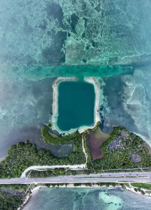 Framed Print : Aerial view of Horseshoe beach and blue hole ocean along Florida Keys coast Framed Print : Aerial view of Horseshoe beach and blue hole ocean along Florida Keys coast